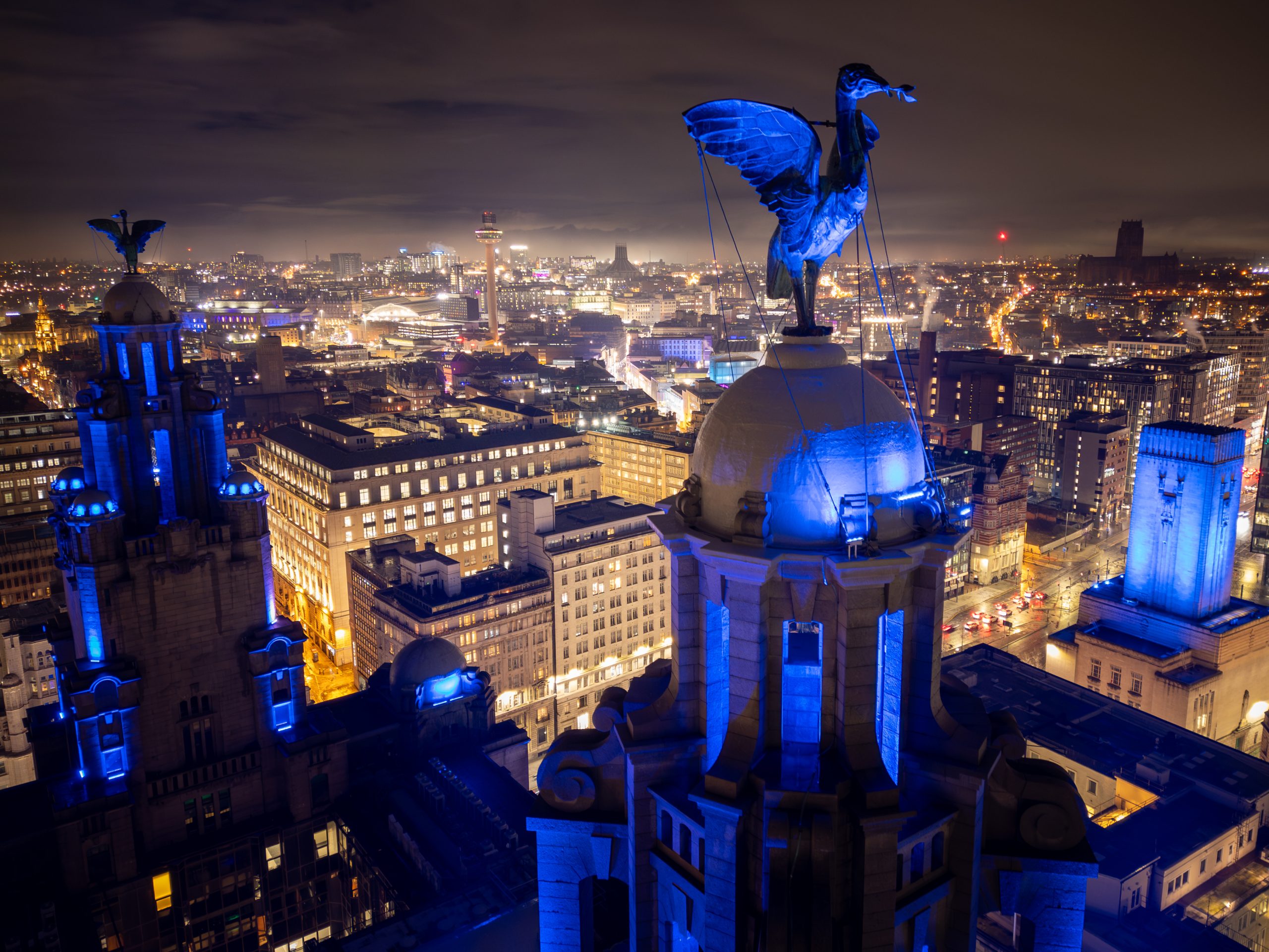 Liverpool waterfront illuminated blue